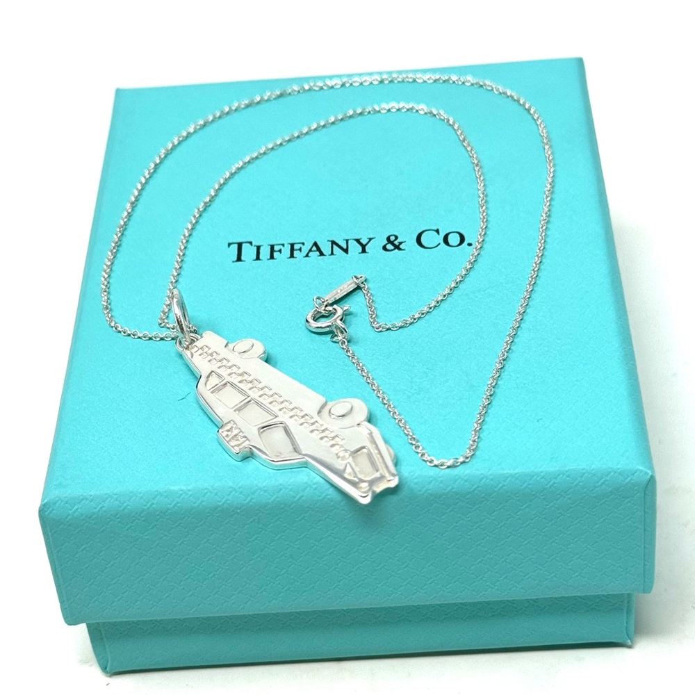 Authentic Tiffany & co. Booklet Taxi Yellow Cab Pendant Necklace.